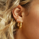 gold waterproof hoop earring with cubix zirconia huggie