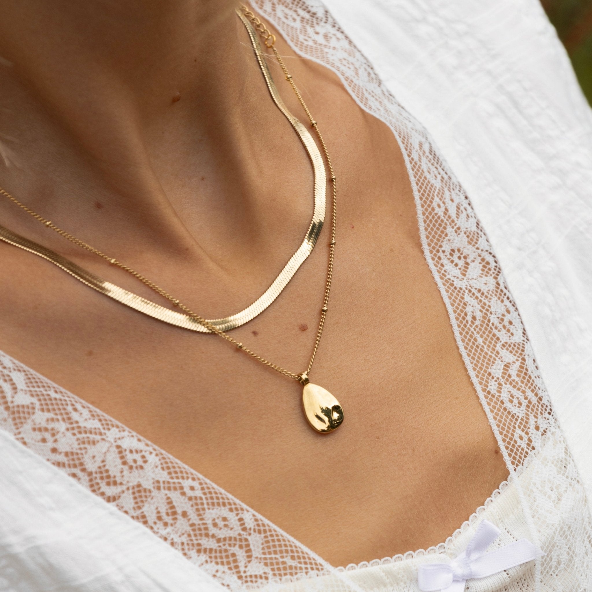 The Waterdrop PendantBy Rae